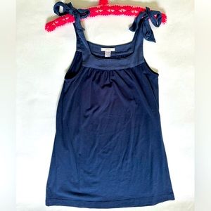 Super cute navy tank with silky shoulder tie ribbons